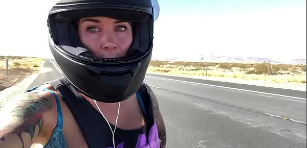 felicity feline riding on aprilia tuono motorcycle